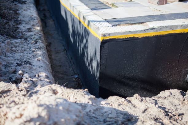Professional Waterproofing technician working in Lyons, KS